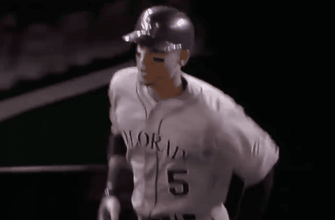 Carlos González in action, showcasing his talent and impact at Coors Field.
